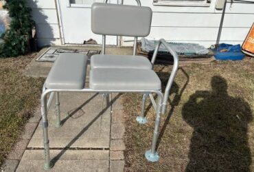 Shower bench with adjustable back rest and padded arms