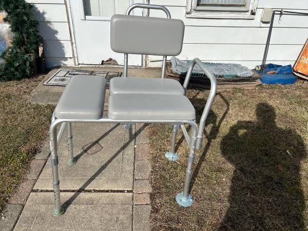 Shower bench with adjustable back rest and padded arms